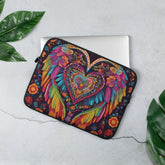 a laptop case with a colorful heart on it